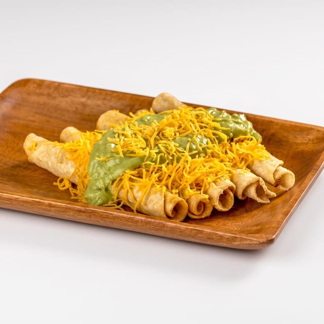 Rolled Tacos with Cheese & Guacamole.